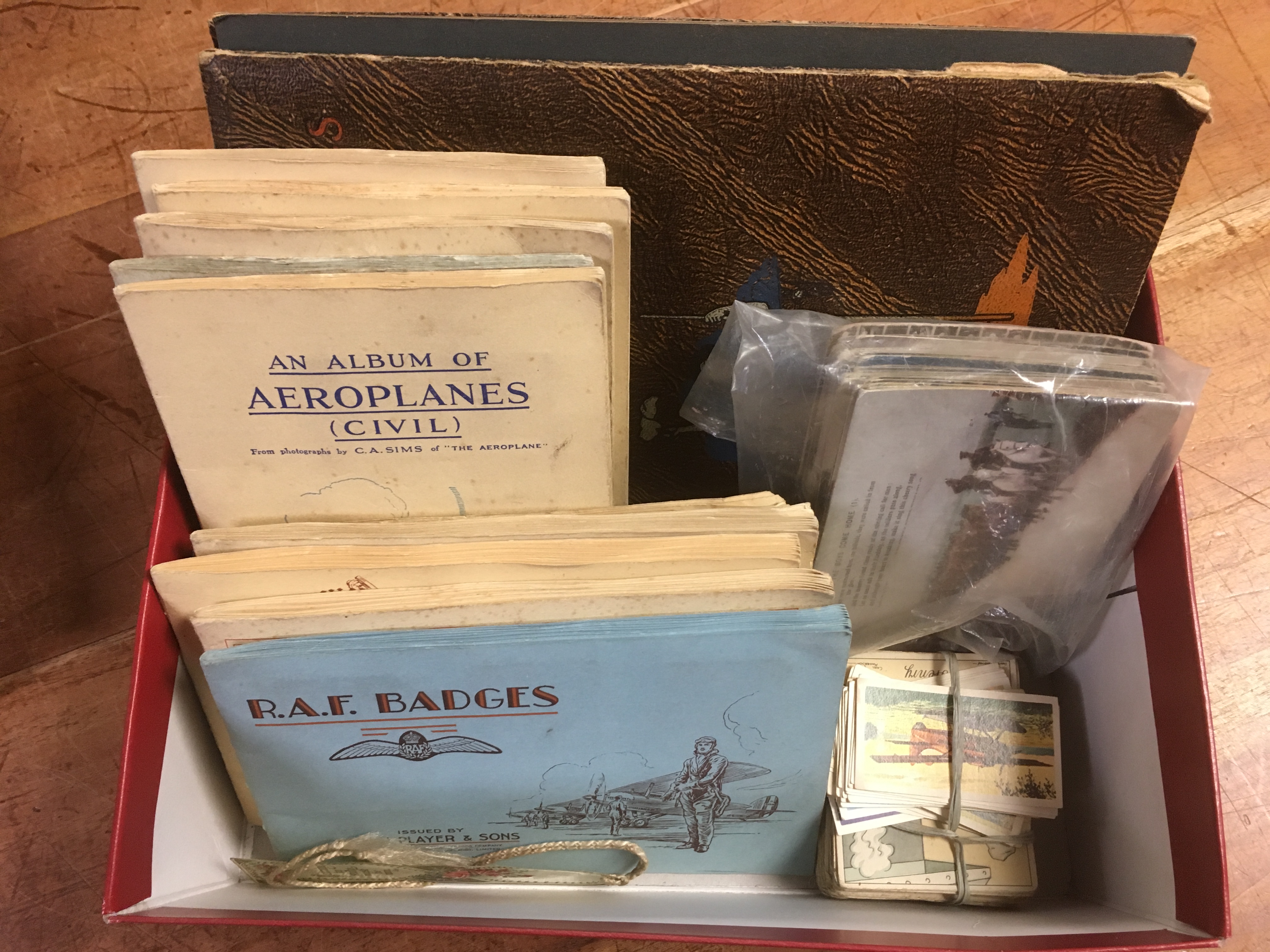 BOX WITH CIGARETTE IN SLOT IN ALBUM, STUCK DOWN PENNY ALBUMS (10), AND LOOSE,