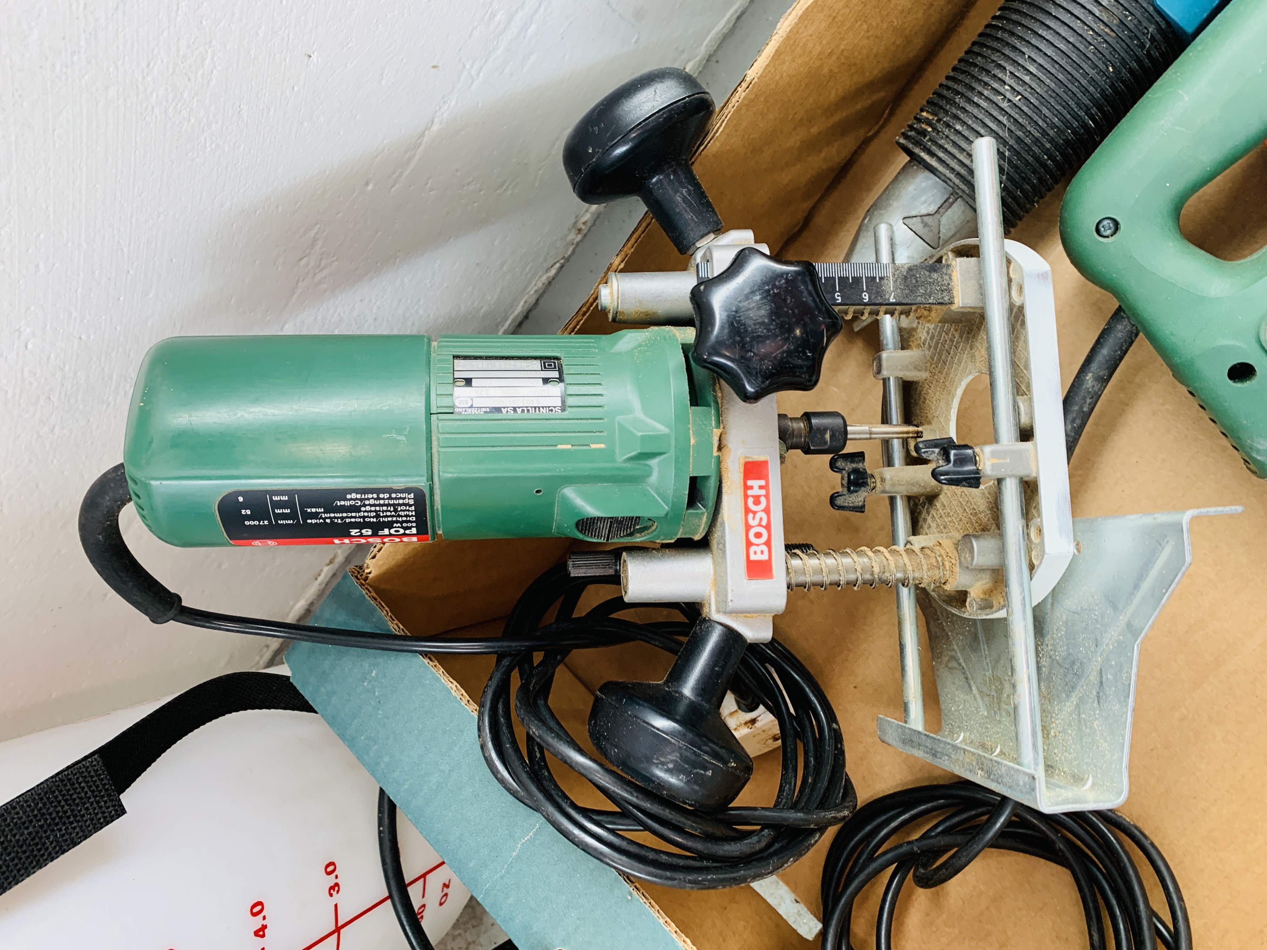 A BOSCH POF52 PLUNGE ROUTER, A BOSCH PST55-PE ELECTRIC JIGSAW, A BLACK AND DECKER HEAT GUN, - Image 4 of 7