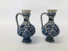 PAIR OF GERMAN SALT GLAZED STONEWARE EWERS H 18.5CM.