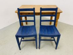 A SOLID PINE KITCHEN TABLE AND TWO BLUE PAINTED KITCHEN CHAIRS WITH SLATTED SEATS (TABLE 122 X
