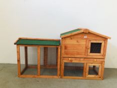A TWO TIER RABBIT HUTCH WITH ADDITIONAL RUN LENGTH 146CM. X DEPTH 46CM. X HEIGHT 85CM.