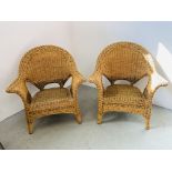 A PAIR OF WICKER ROLL ARM CONSERVATORY CHAIRS.