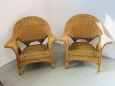 A PAIR OF WICKER ROLL ARM CONSERVATORY CHAIRS.