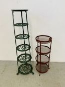 A GREEN PAINTED CAST METAL SIX TIER PAN STAND HEIGHT 122CM AND A RED PAINTED WROUGHT METAL FOUR