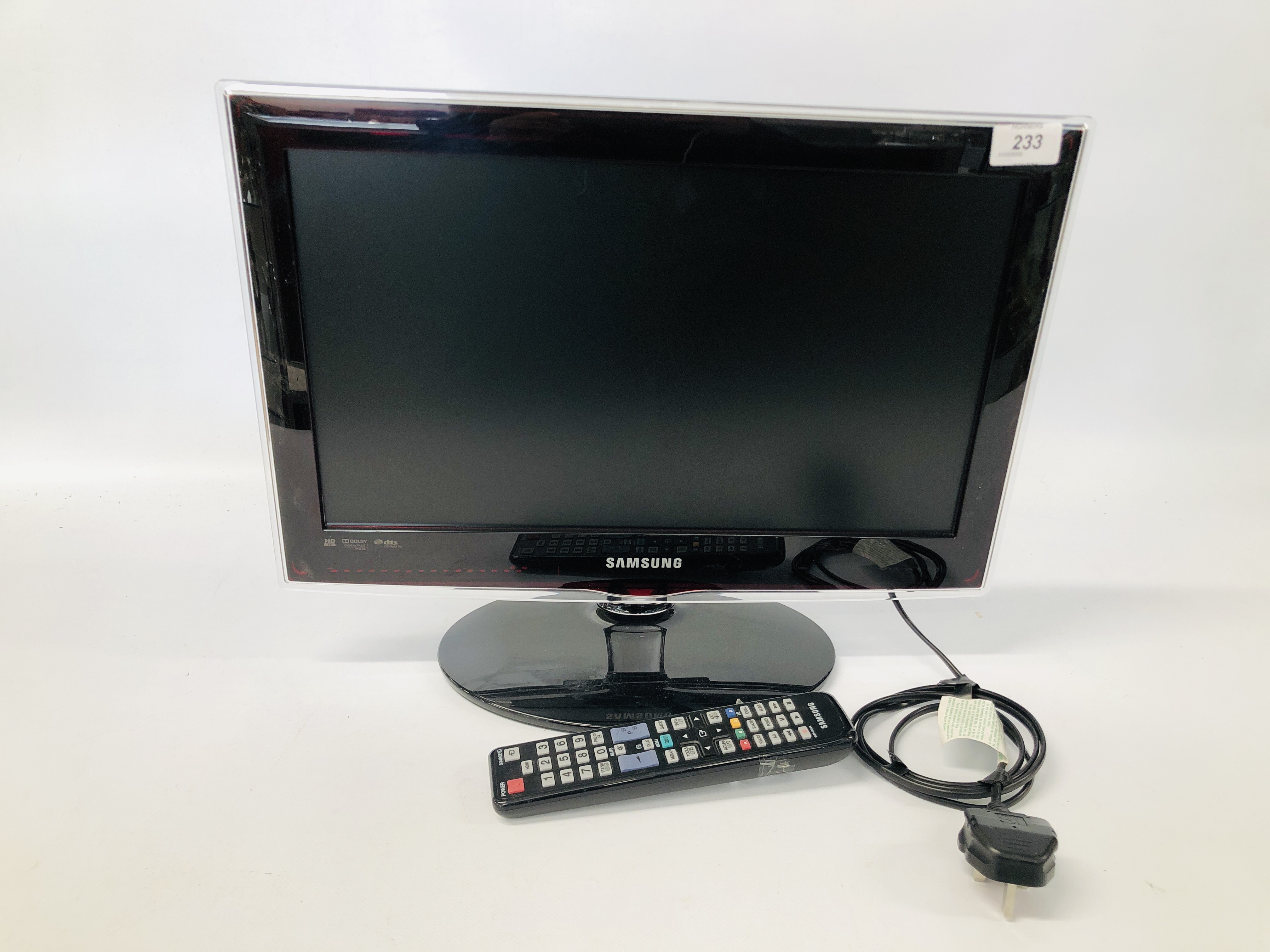 A SAMSUNG 19 INCH TV COMPLETE WITH REMOTE - SOLD AS SEEN.