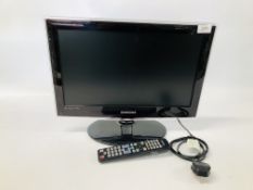 A SAMSUNG 19 INCH TV COMPLETE WITH REMOTE - SOLD AS SEEN.