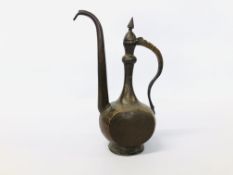 A VINTAGE COPPER PERSIAN COFFEE POT HEIGHT INCLUDING SPOUT 38CM.