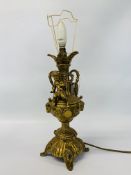 A HEAVY BRASS TABLE LAMP WITH CHERUB DETAIL HEIGHT 56CM - SOLD AS SEEN.