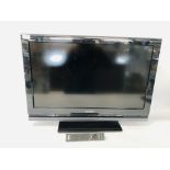 A SONY 32 INCH FLAT SCREEN TV COMPLETE WITH REMOTE - SOLD AS SEEN.