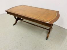 A REPRODUCTION RECTANGULAR LYRE END COFFEE TABLE WITH TOOLED TAN LEATHER TO TOP
