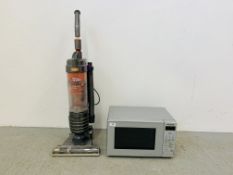 A PANASONIC MICROWAVE OVEN AND VAX MACH AIR LIGHTWEIGHT VACUUM CLEANER - SOLD AS SEEN.