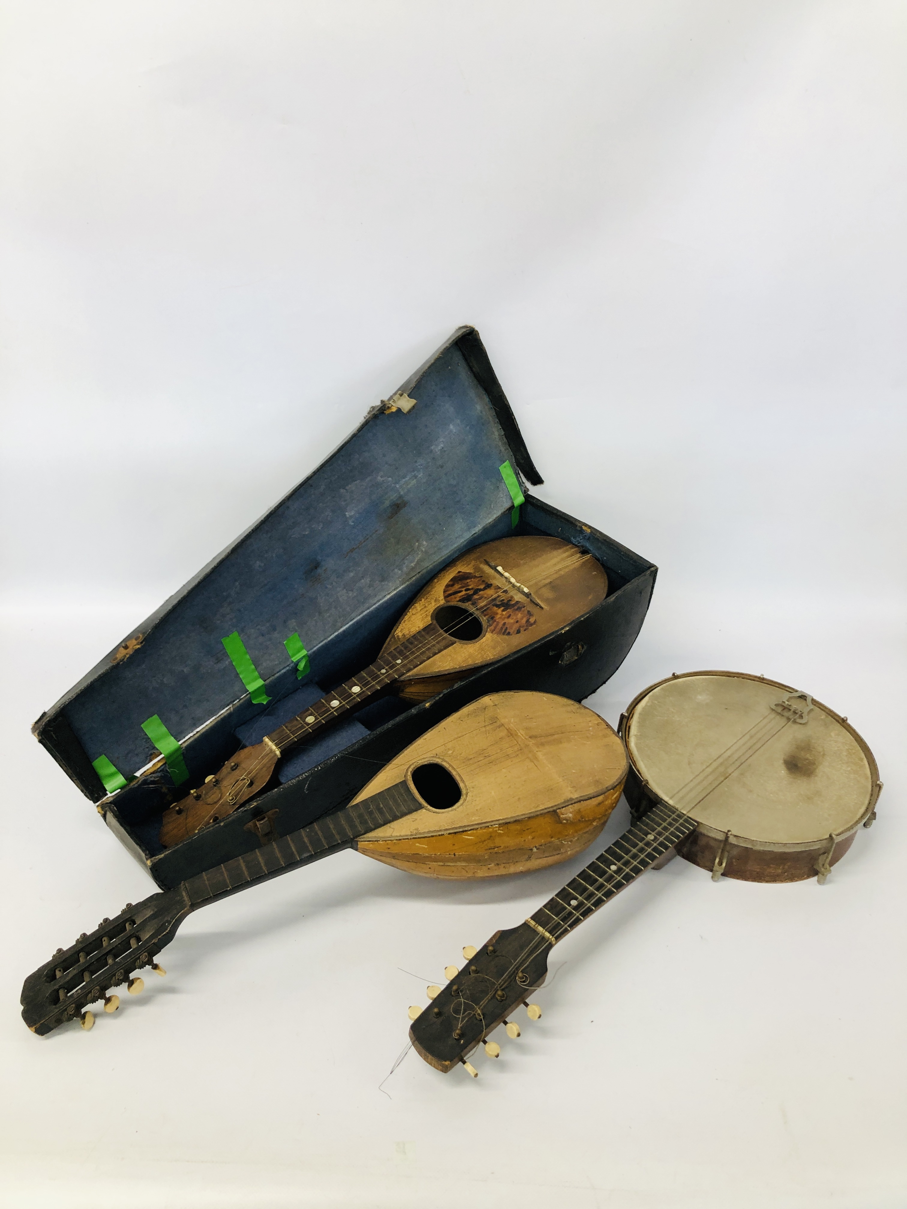 A VINTAGE MANDOLIN WITH TORTOISESHELL DETAIL MARKED "CATANIA" IN FITTED CASE AND ONE OTHER (BOTH