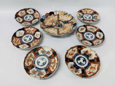 SEVEN JAPANESE IMARI PATTERNED PLATES, THE LARGEST WITH LOBED EDGE MEASURING 31CM DIA.