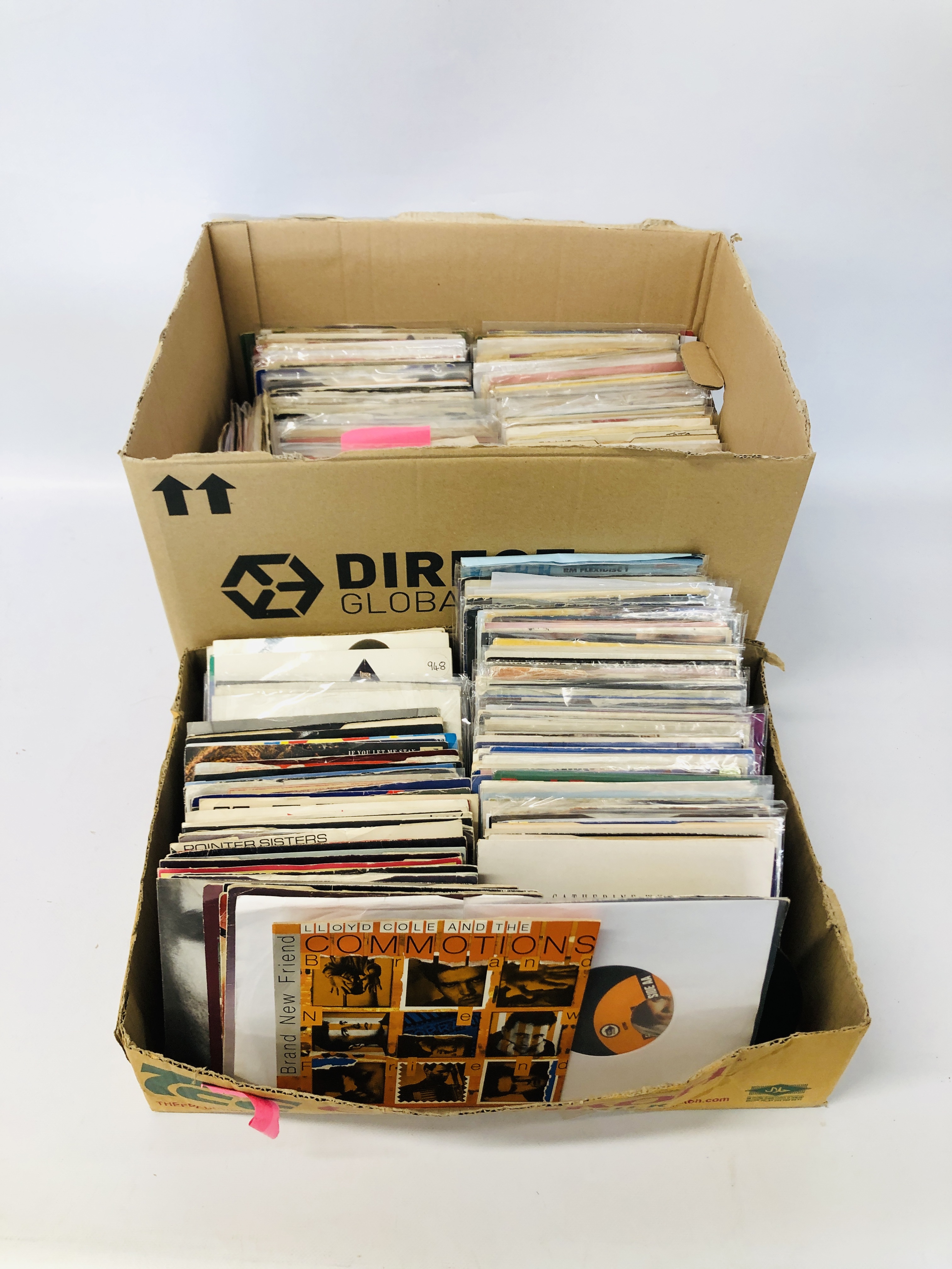 2 BOXES CONTAINING A QUANTITY OF 45 RPM SINGLES TO INCLUDE INXS, CATHERINE WHEEL, PHIL COLLINS,