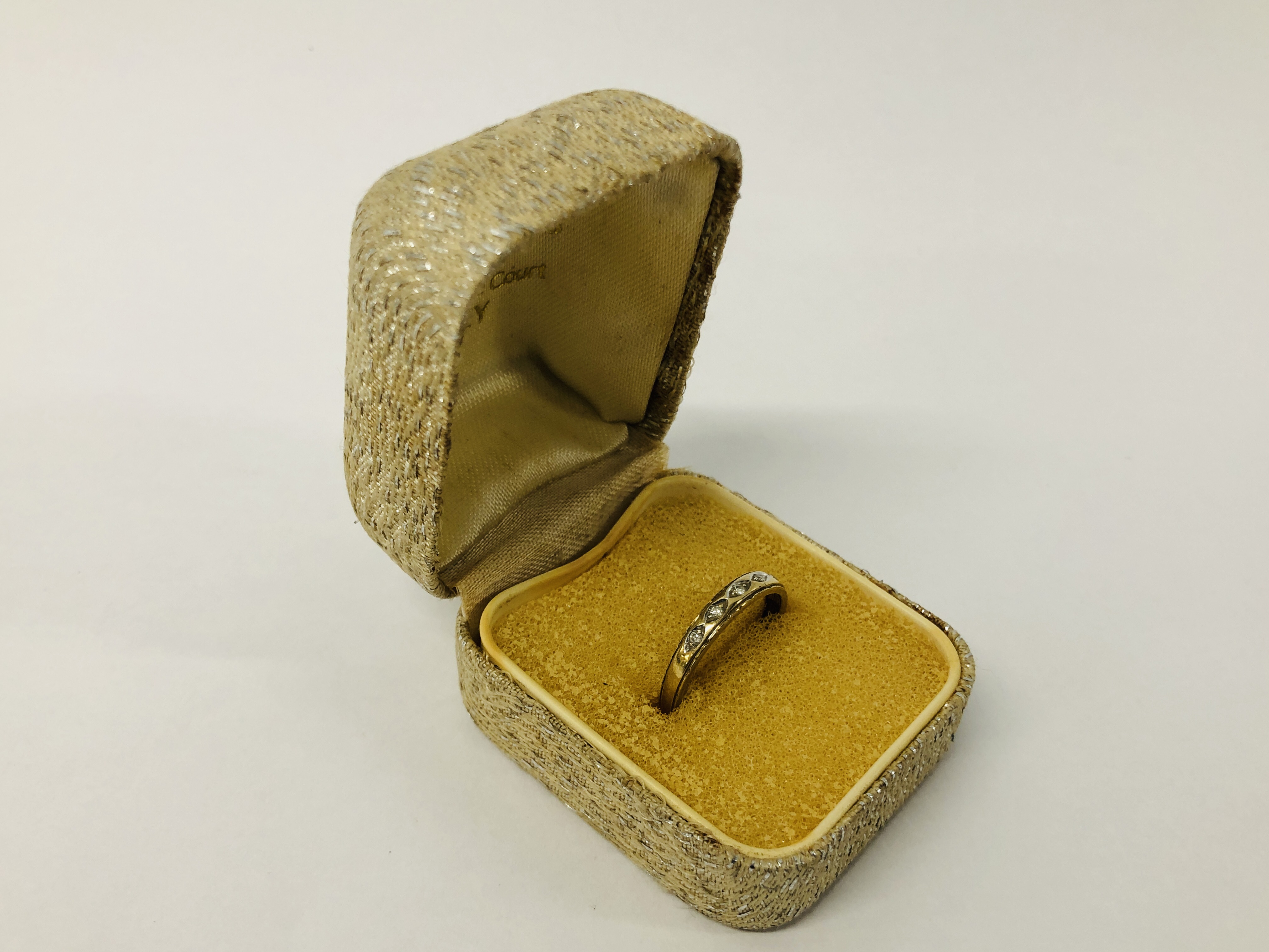 A SIX STONE DIAMOND BAND RING MARKED 9K SIZE J/K. - Image 9 of 11