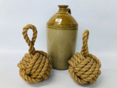 VINTAGE STONEWARE 2 GALL FLAGON ALONG WITH A PAIR OF ROPE BALL DOORSTOPS.