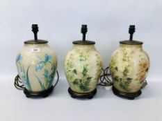 PAIR OF DESIGNER GLASS FLORAL PATTERN LAMP BASES + ONE OTHER H 28CM - SOLD AS SEEN.