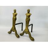 A PAIR OF LARGE HEAVY BRASS FIRE DOGS FASHIONED AS CENTURION FIGURES WITH FISH DETAILED FEET HEIGHT