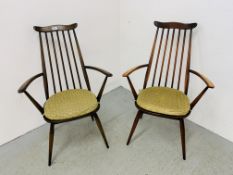 A PAIR OF ERCOL STICK BACK CARVER CHAIRS.