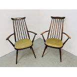 A PAIR OF ERCOL STICK BACK CARVER CHAIRS.