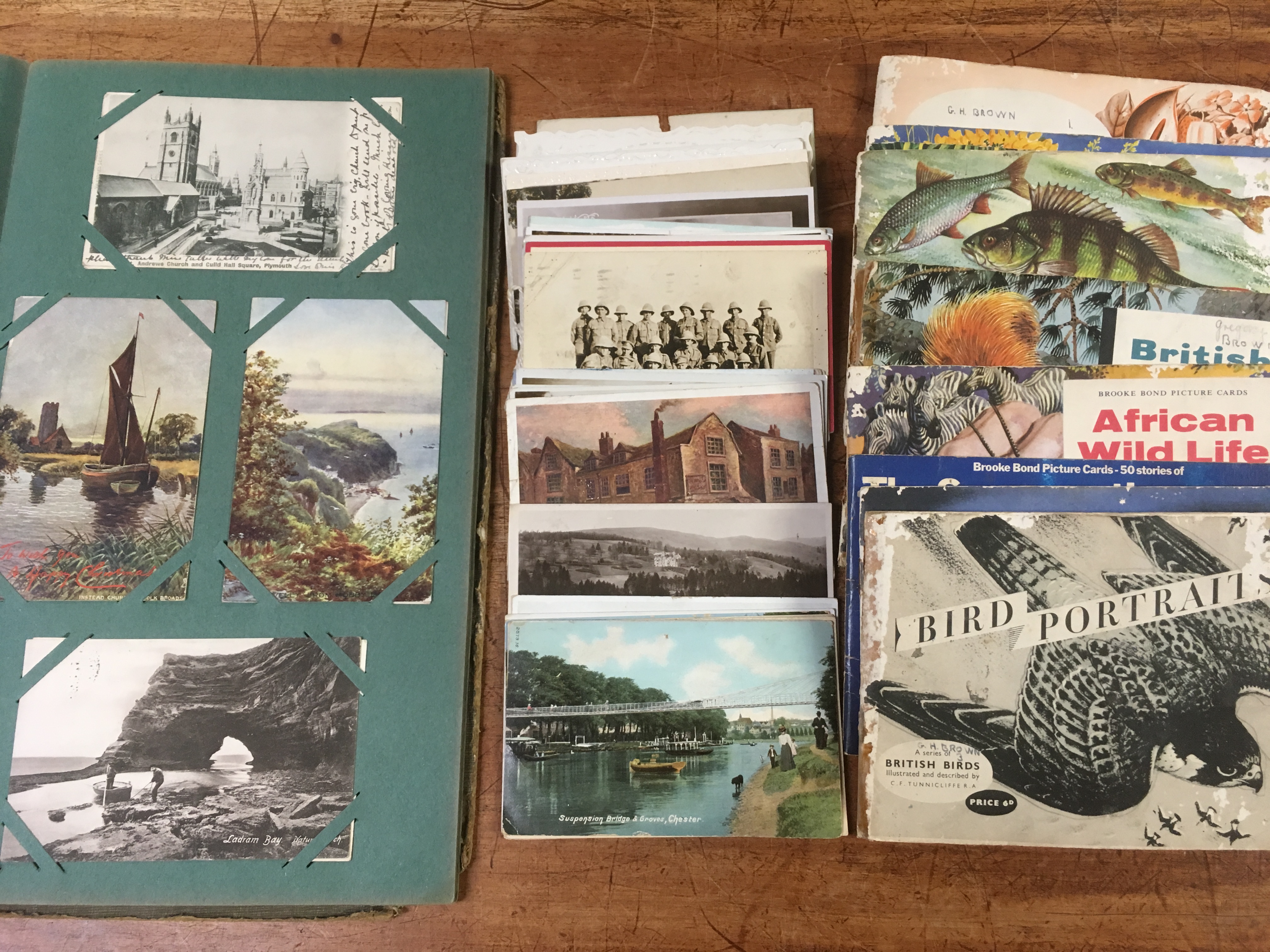 MIXED POSTCARDS IN ALBUM AND LOOSE, EDINBURGH FIRE BRIGADE (2), SCOTCH FISHER FOLK, LONDON ZOO,