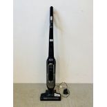 A BOSCH ATHLET 25.2 VOLT CORDLESS VACUUM CLEANER WITH CHARGER - SOLD AS SEEN.