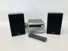 A PANASONIC CD STEREO SYSTEM ACCOMPANIED BY A PAIR OF PANASONIC SPEAKERS H 23CM - SOLD AS SEEN.