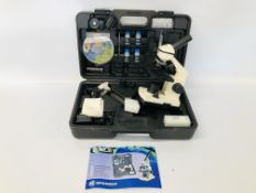 A BRESSER ELECTRIC MICROSCOPE IN HARD CARRY CASE - SOLD AS SEEN.