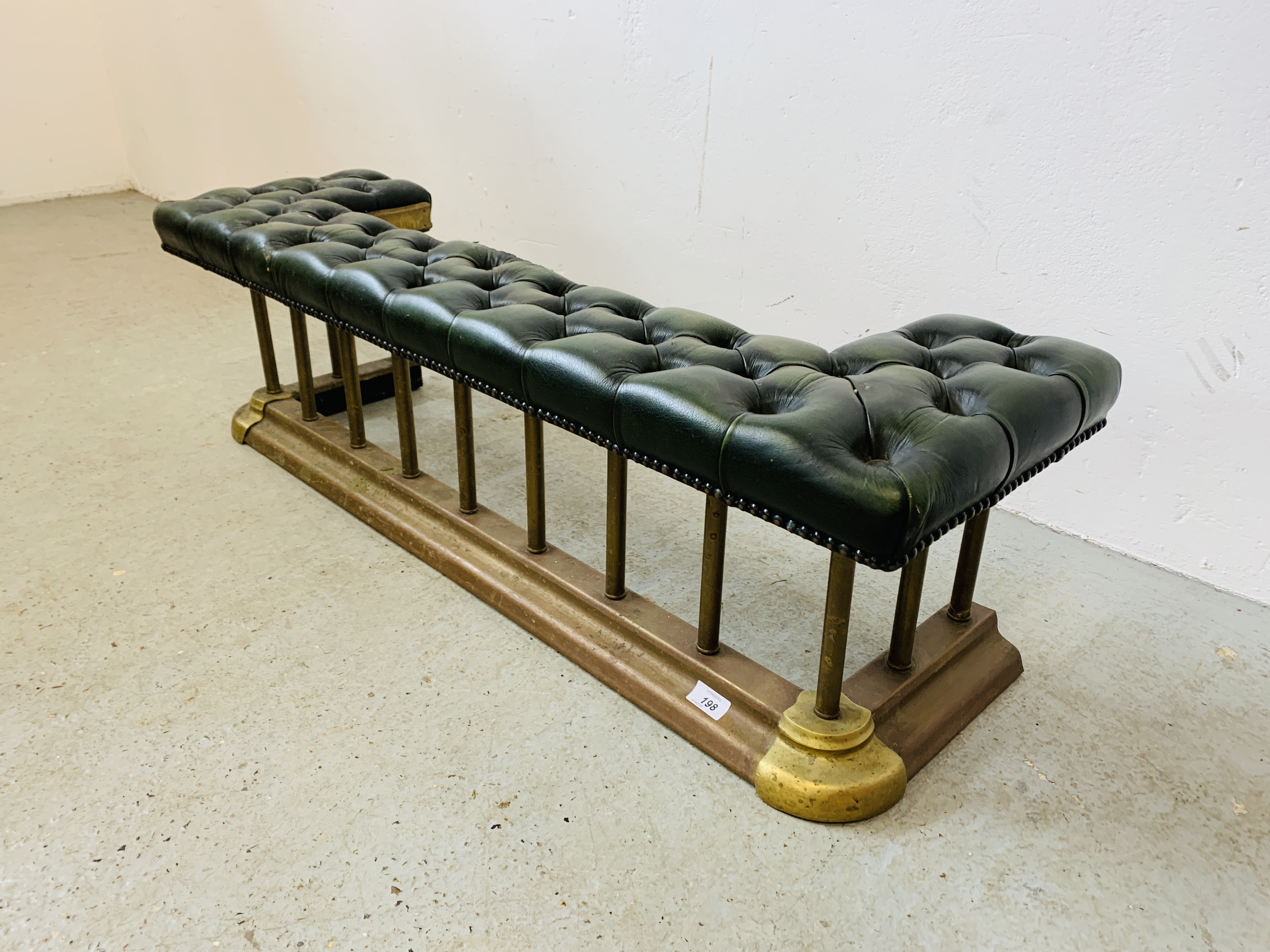 A BRASS FIRE CURB SEAT, THE GREEN LEATHER BUTTON BACK SEAT REQUIRING RESTORATION - MAX. - Image 3 of 10