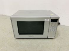 A PANASONIC COMPACT MICROWAVE OVEN - SOLD AS SEEN.