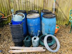 SIX POLYTHENE STORAGE DRUMS WITH COVERS, TWO BUNDLES OF GARDEN CANES, ROLL OF RESTRAINING WIRE,