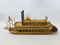 A VINTAGE HAND BUILT WOODEN MODEL OF A STEAM BOAT "KING OF MISSISSIPPI" LENGTH 66CM. HEIGHT 30CM.
