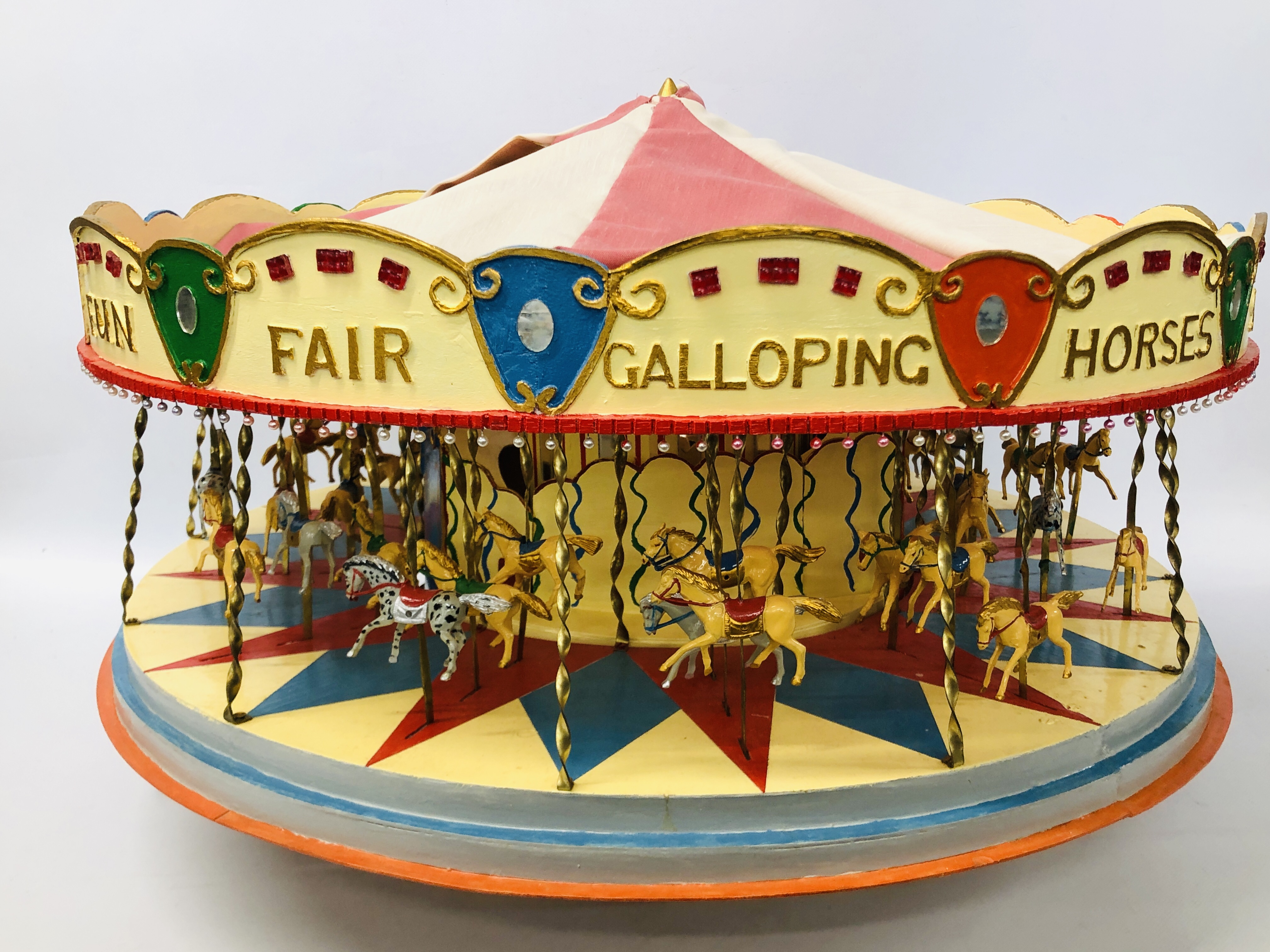 A VINTAGE HANDCRAFTED WOODEN MODEL OF A FAIRGROUND CAROUSEL WITH MOTORISED ACTION AND LIGHTS - - Image 7 of 10