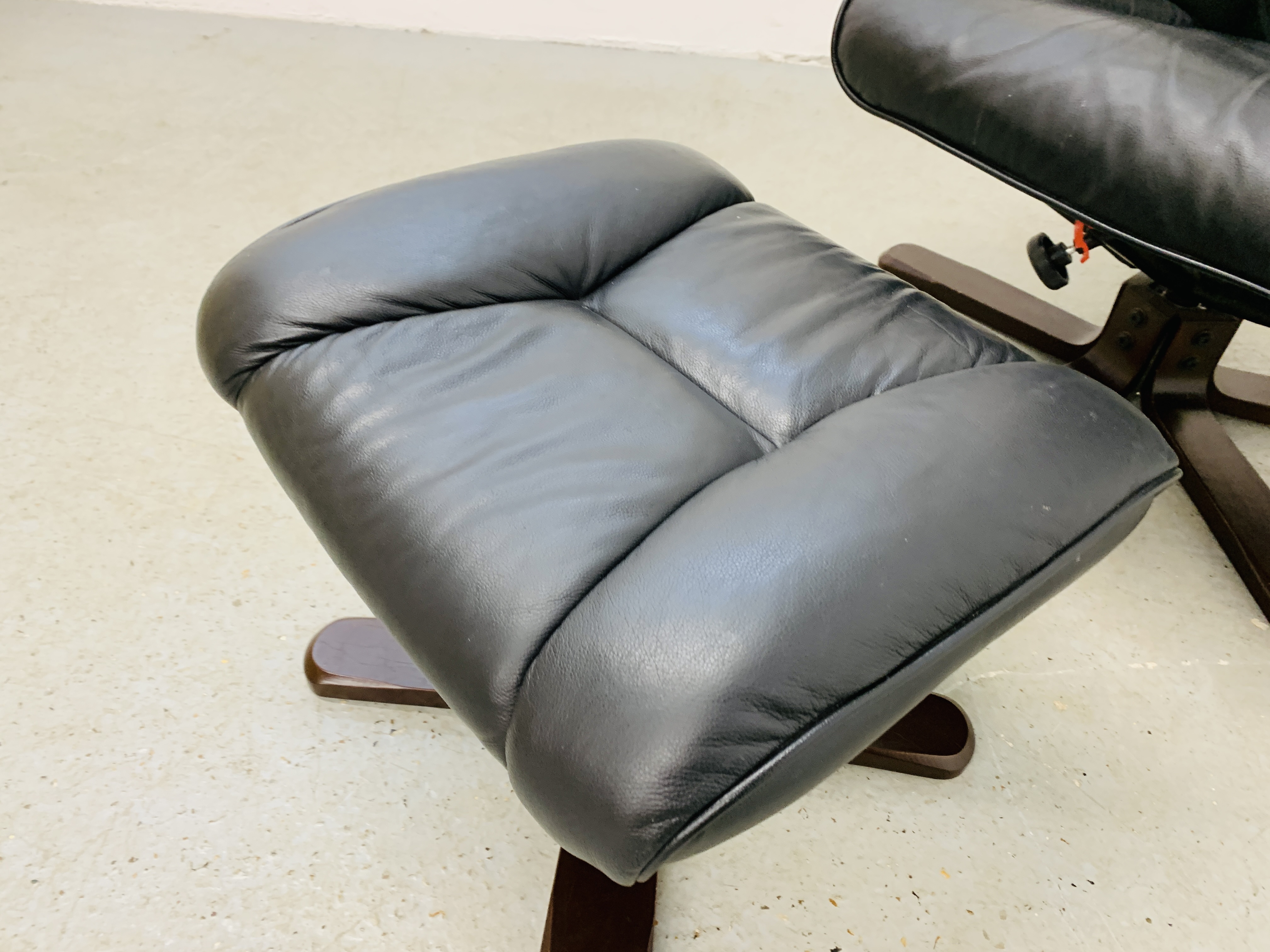 A BLACK LEATHER RELAXER CHAIR AND MATCHING FOOT STOOL. - Image 8 of 8