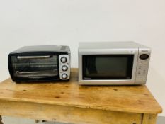 A PANASONIC INVERTER MICROWAVE OVEN AND COOKWORKS COMPACT TABLE TOP OVEN - SOLD AS SEEN.