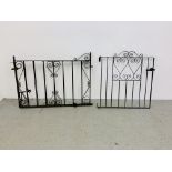 A PAIR OF WROUGHT IRON GATES AND ONE OTHER WROUGHT IRON GATE