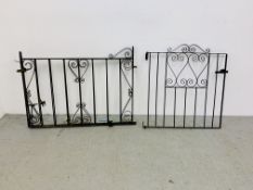 A PAIR OF WROUGHT IRON GATES AND ONE OTHER WROUGHT IRON GATE