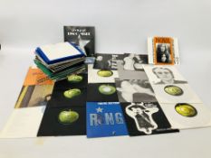 CASE CONTAINING APPROX 60 SINGLES RECORDS RELATING TO JOHN LENON, THE BEATLES,