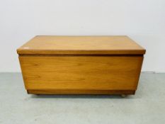 A MID CENTURY TEAK LOW LEVEL CABINET WITH FALLING FRONT WIDTH 102CM. DEPTH 49CM. HEIGHT 52CM.