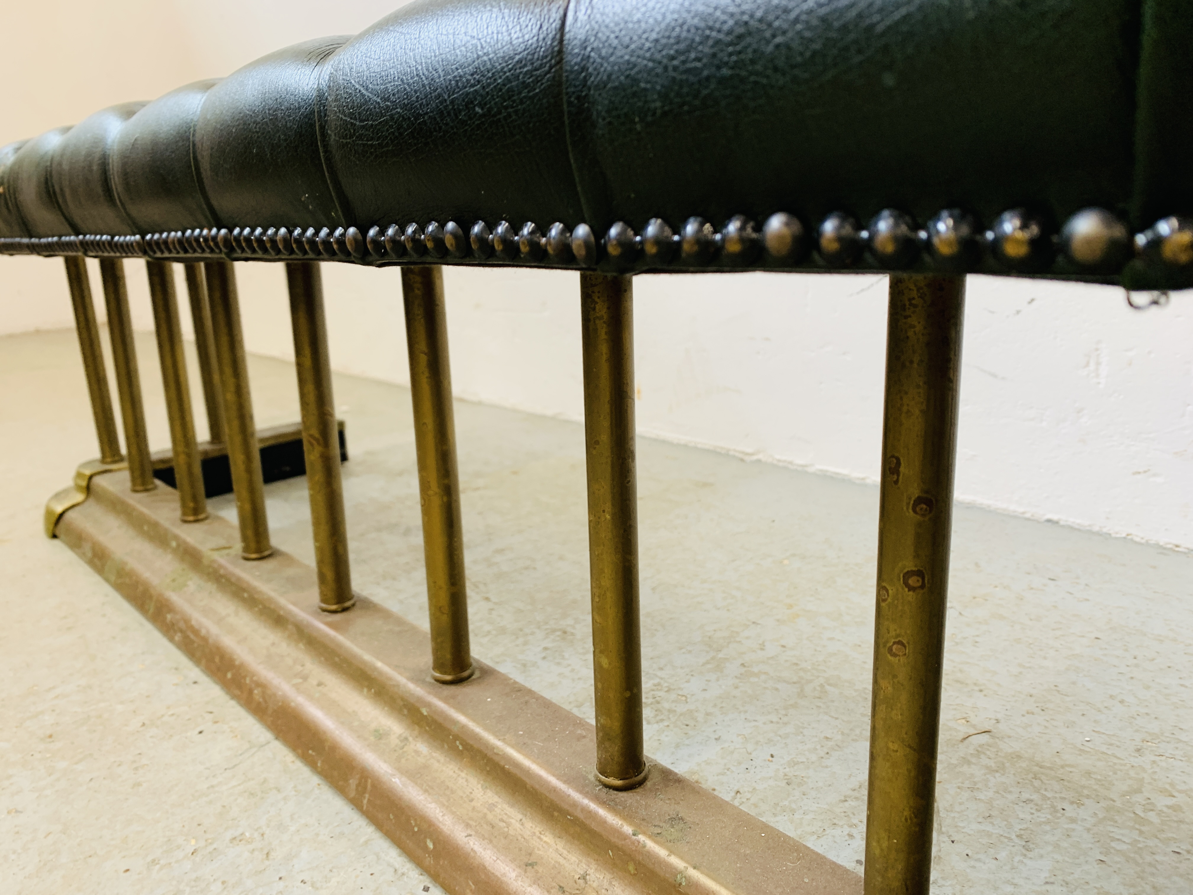 A BRASS FIRE CURB SEAT, THE GREEN LEATHER BUTTON BACK SEAT REQUIRING RESTORATION - MAX. - Image 7 of 10