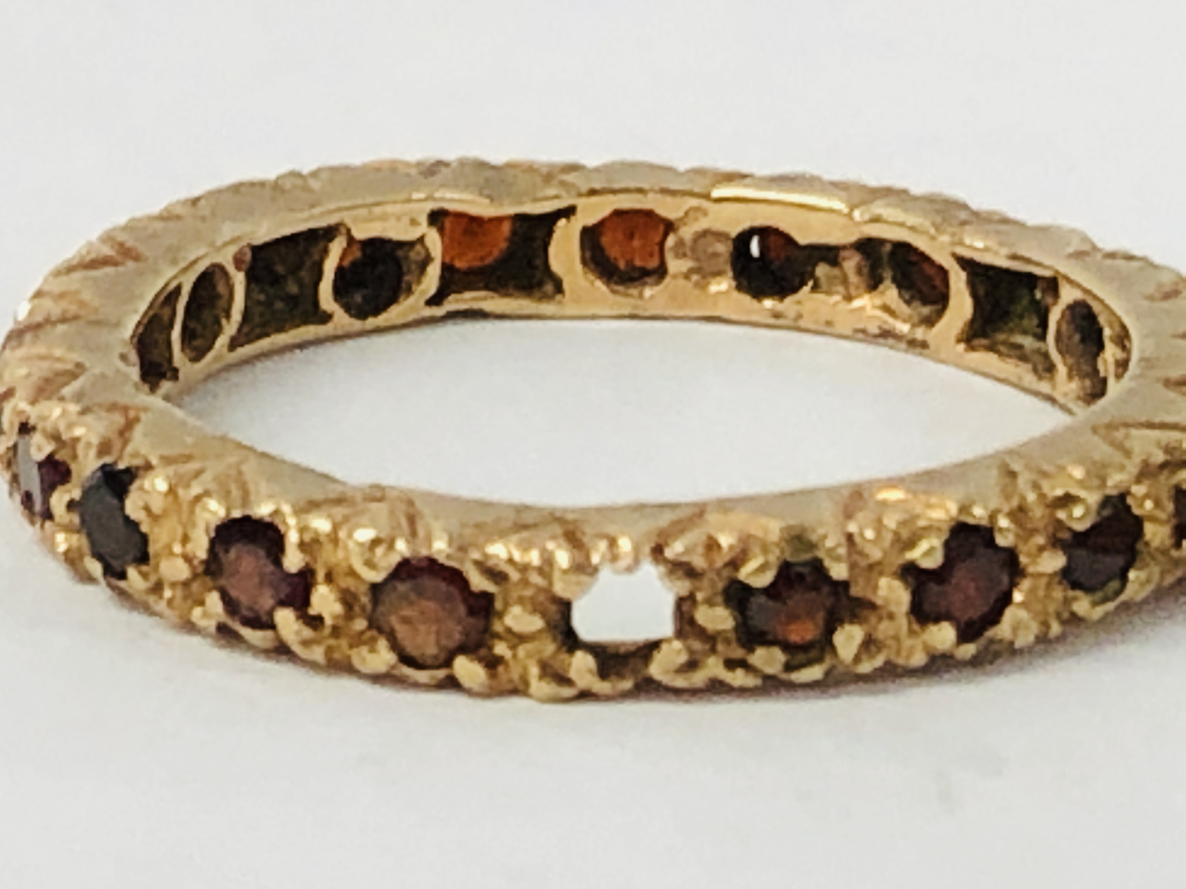 A YELLOW METAL ETERNITY RING, - Image 7 of 11