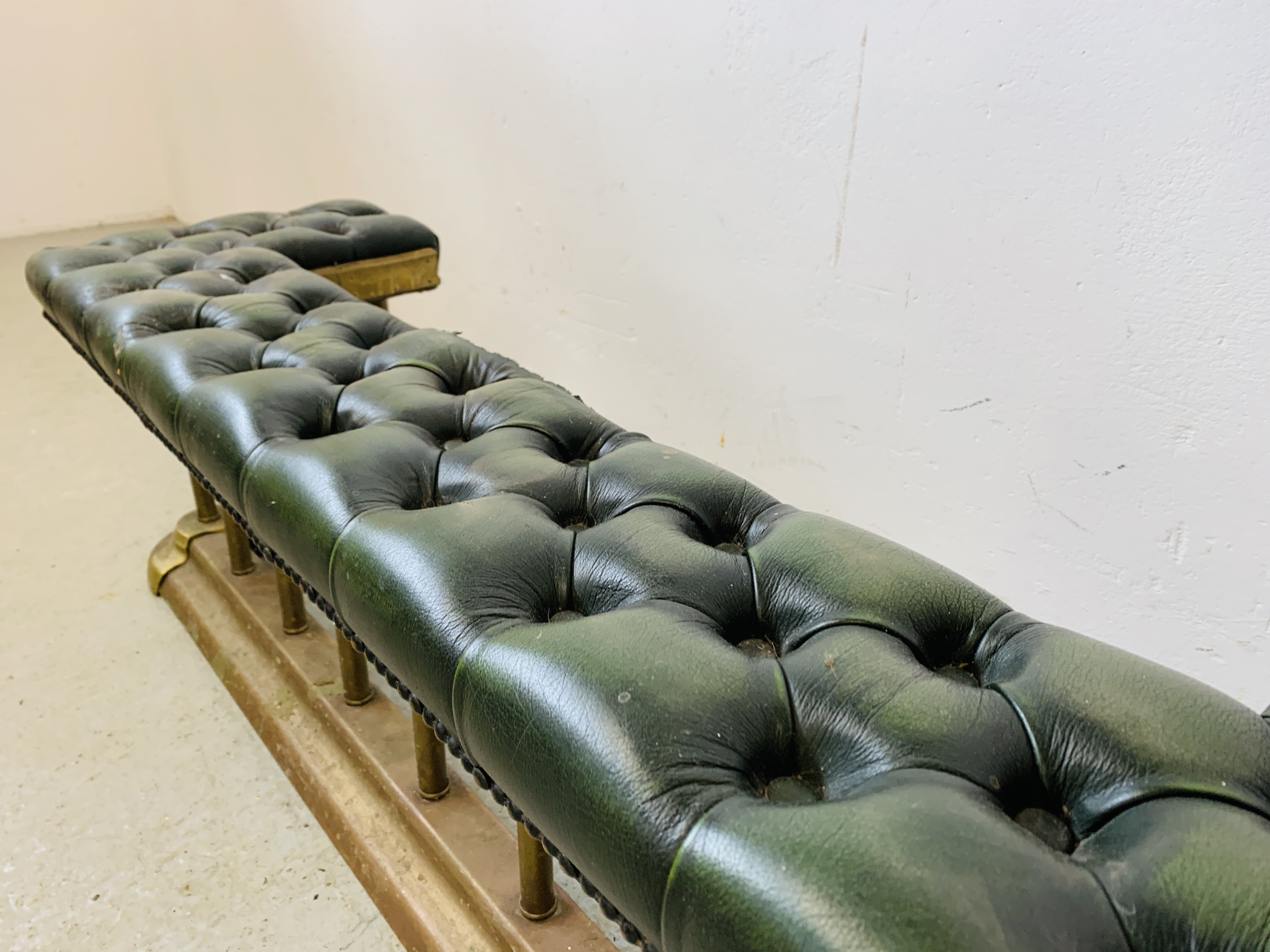 A BRASS FIRE CURB SEAT, THE GREEN LEATHER BUTTON BACK SEAT REQUIRING RESTORATION - MAX. - Image 6 of 10