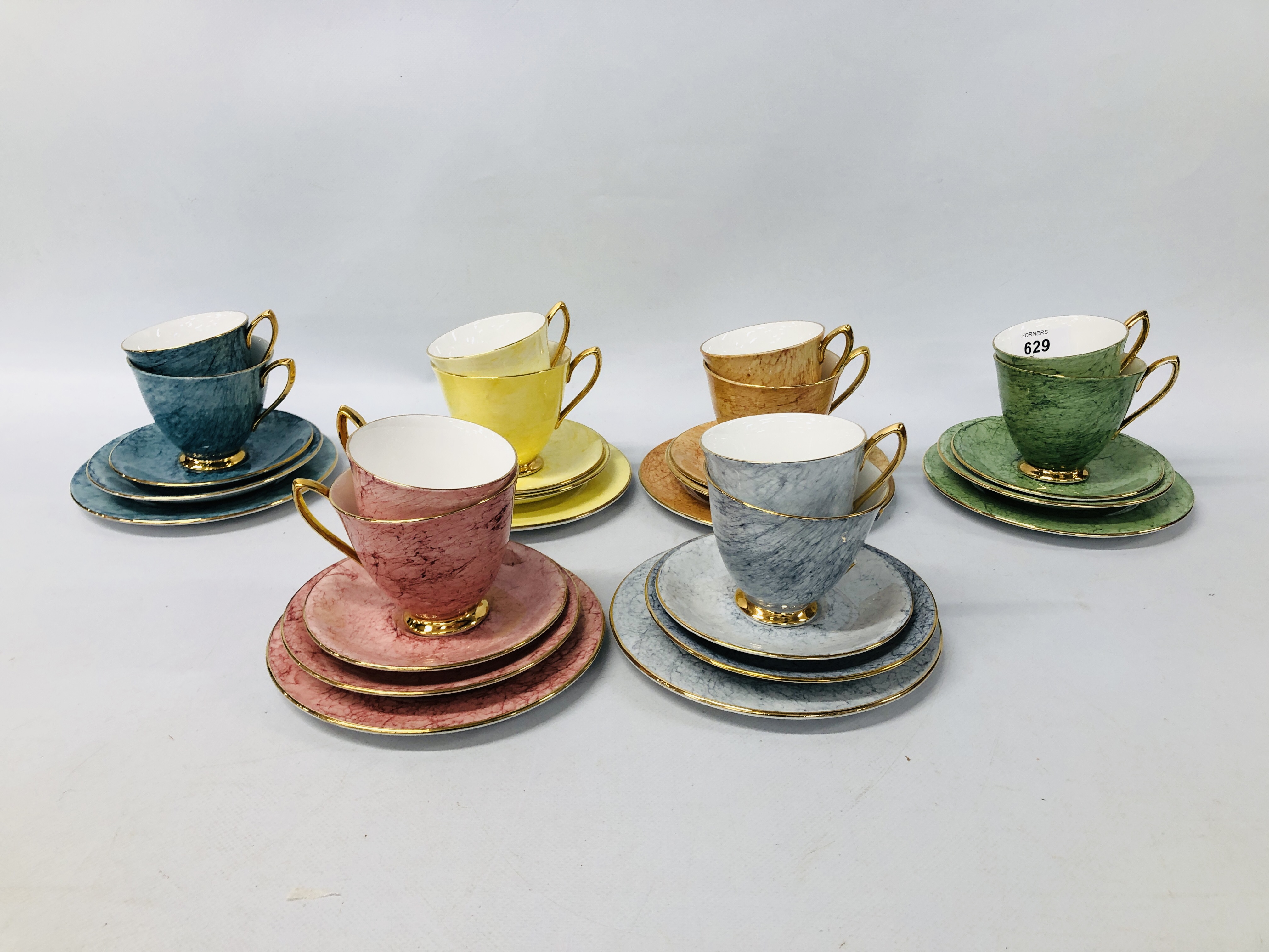COLLECTION OF ROYAL ALBERT GOSSAMER CUPS AND SAUCERS (APPROC.