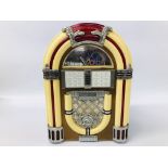 A RADIO/TAPE PLAYER MINIATURE JUKE BOX