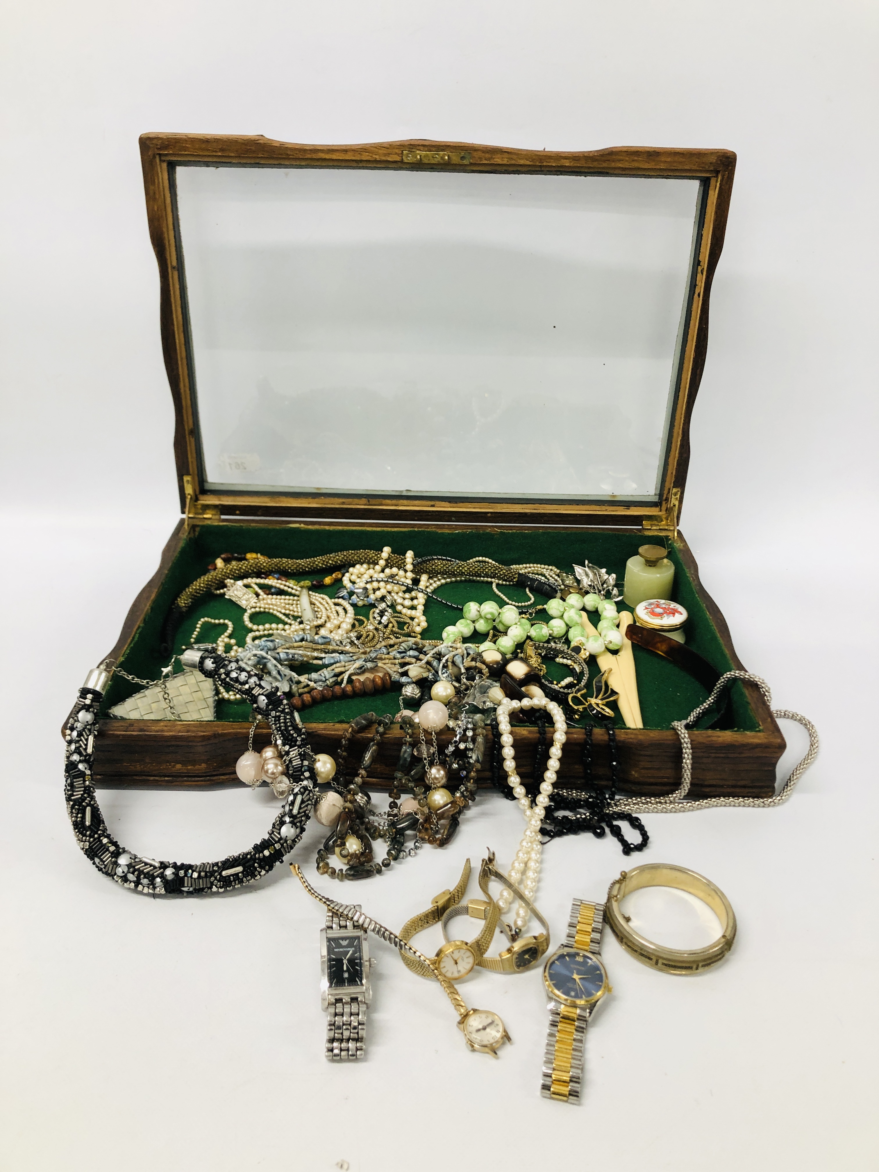 A GLASS TOP DISPLAY CASE CONTAINING A QUANTITY MIXED COSTUME JEWELLERY, ETC.