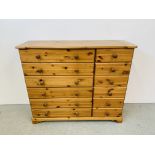 A HONEY PINE 12 DRAWER COMBINATION CHEST OF DRAWERS