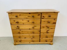 A HONEY PINE 12 DRAWER COMBINATION CHEST OF DRAWERS