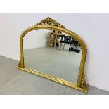 A LARGE OVERMANTEL MIRROR