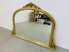 A LARGE OVERMANTEL MIRROR