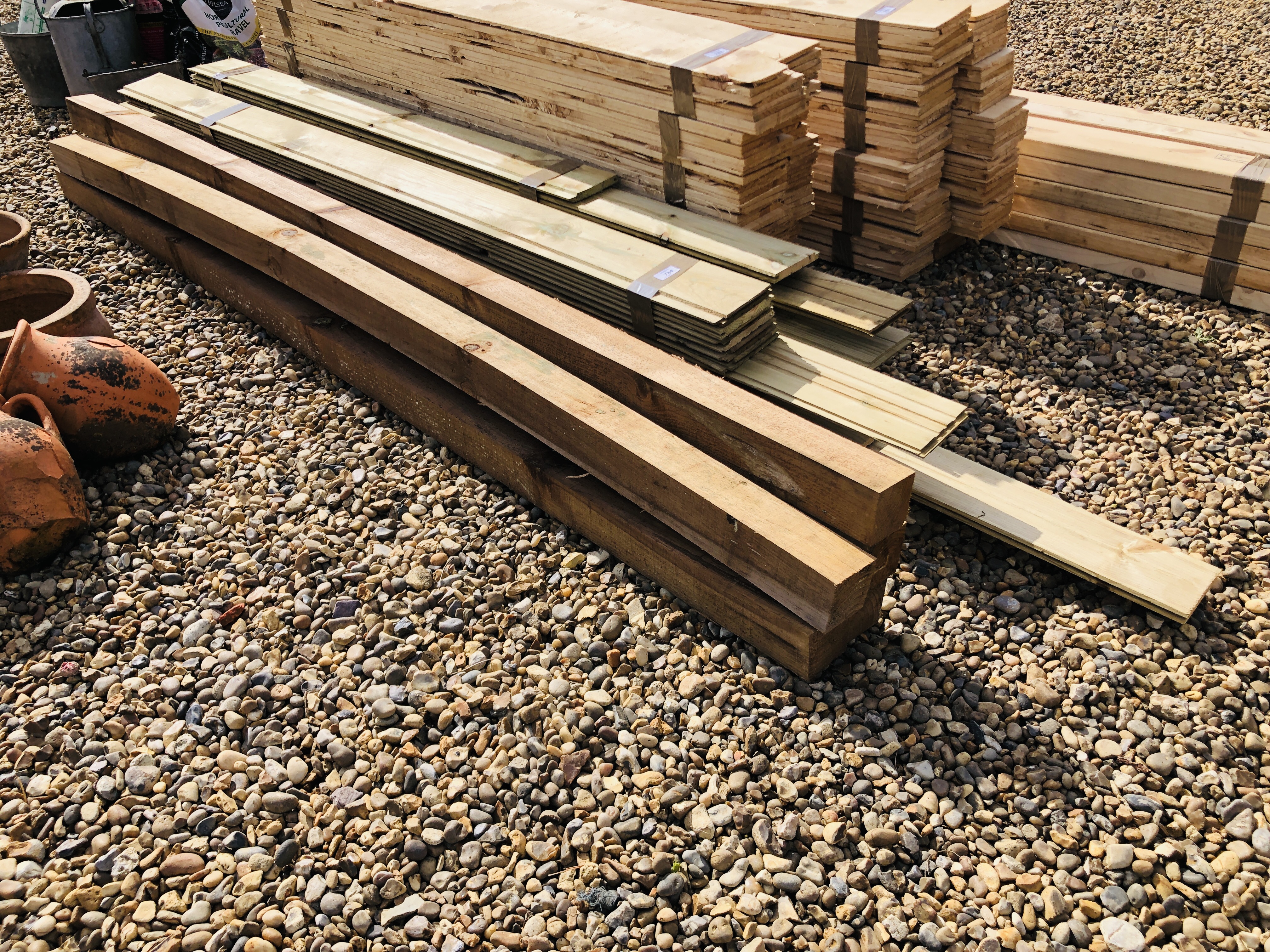 SIX BUNDLES OF TANALIZED SHIPLAP BOARDING VARIOUS LENGTHS AND 5 X 2.